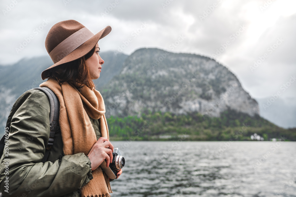 Attractive girl with a retro camera by the Austrian lake Attractive girl with a retro camera by the Austrian lake