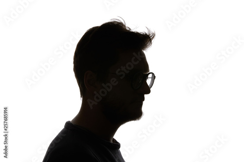 Silhouette of man in glasses with beard isolated on white