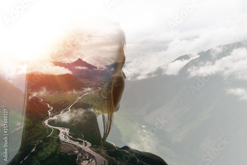 Schilderij op canvas Double exposure of girl and mountains in clouds