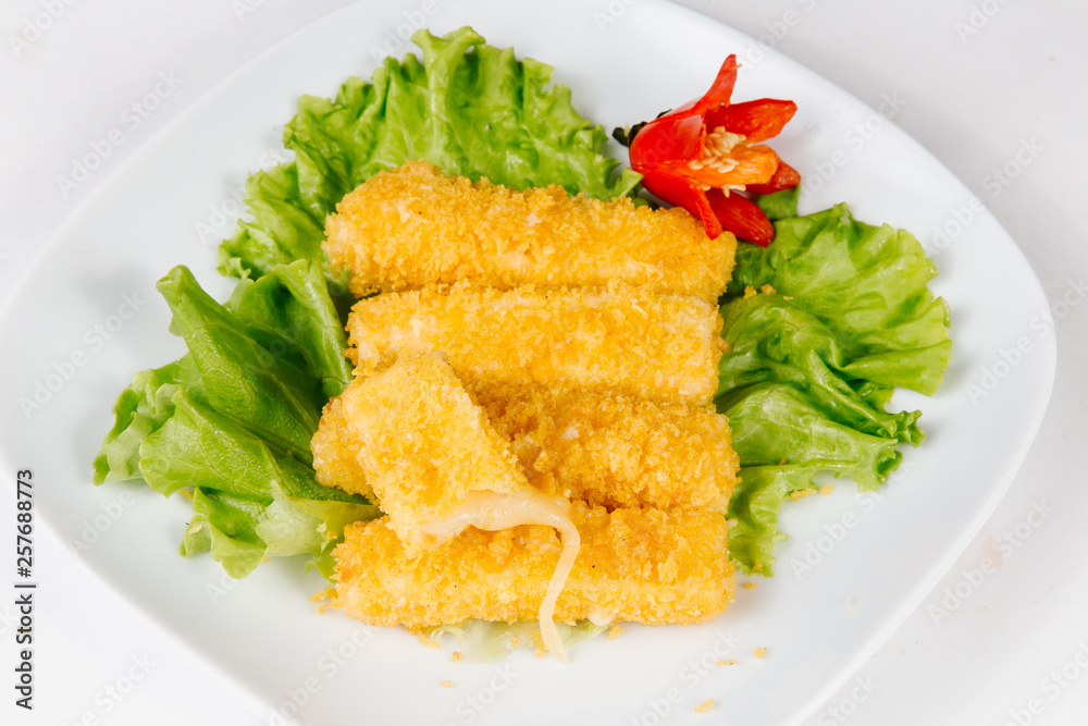 Traditional oriental cuisine of Vietnam. Tempura cheese nem in breading on a white background Traditional oriental cuisine of Vietnam. Tempura cheese nem in breading on a white background