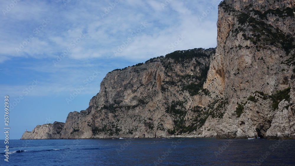 Cliff scenery and rock formations on the island of Capri in the Bay of Naples, Italy. Photographed whilst on a boat trip around the island.
