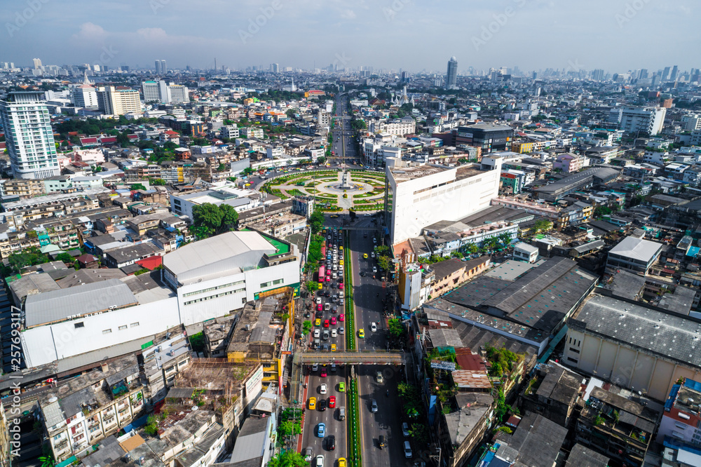 Obraz premium City traffic road with modern building aerial view