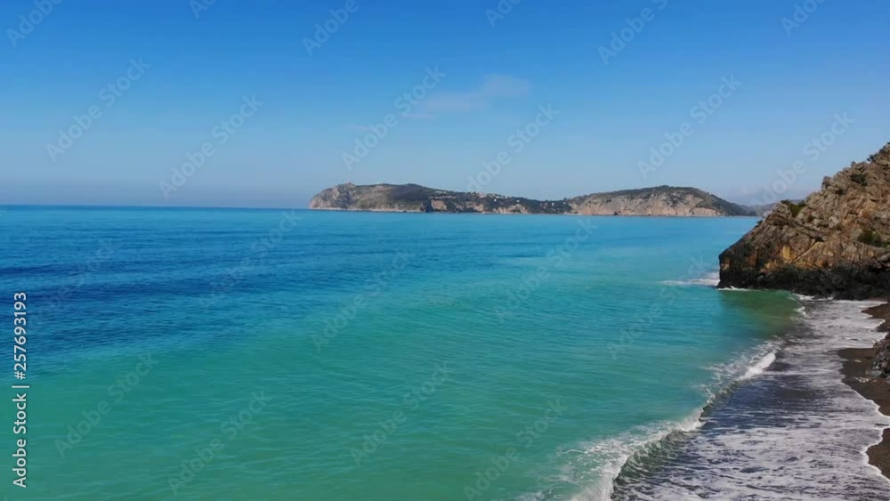 Waves splashing flying back Overflight Along natural rocky Coastline,Turquoise water Sea in italy,4k Aerial Waves splashing flying back Overflight Along natural rocky Coastline,Turquoise water Sea in italy,4k Aerial