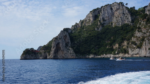 Cliff scenery and rock formations on the island of Capri in the Bay of Naples  Italy. Photographed whilst on a boat trip around the island.
