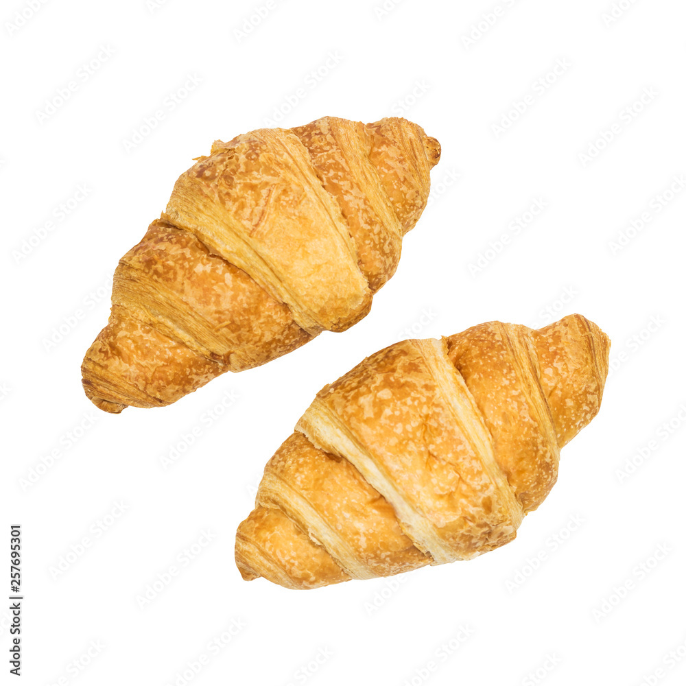 Fresh croissants isolated on white background. Top view. File contains clipping path.
