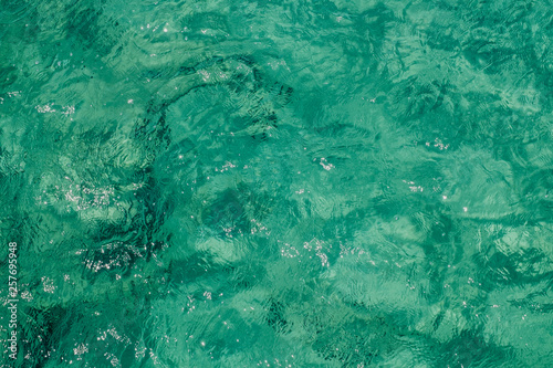 Emerald clean transparet sea water texture.