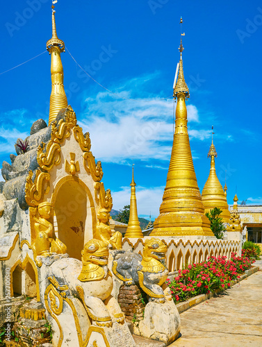 The guardians of old stupas, Kan Tu Kyaung monastery, Pindaya, Myanmar photo