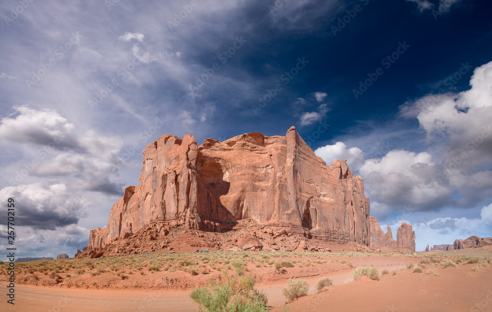 Fototapeta premium Panoramic view of Monument Valley mountain and road across national park
