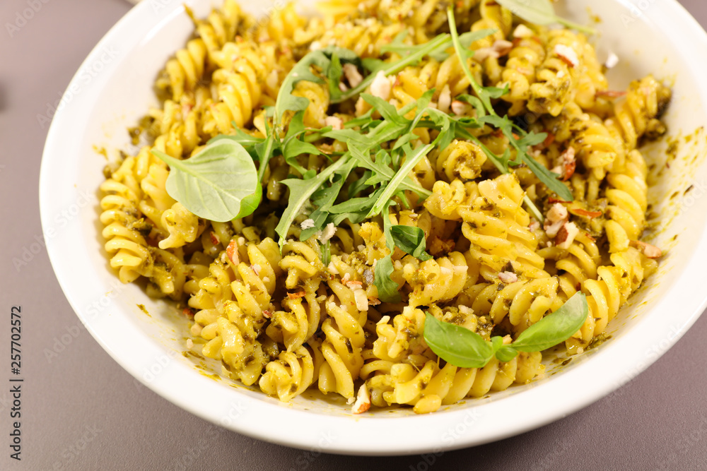 pasta with pesto sauce and arugula pasta with pesto sauce and arugula