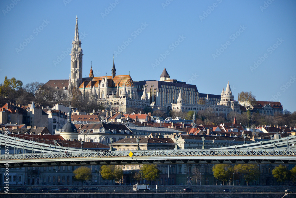 Naklejka premium View across the river Danube to the Hotel La Bellissima linking Buda to Pest in Budapest, Hungary.