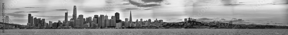 SAN FRANCISCO, CA - AUGUST 4, 2017: Panoramic sunset view of city skyline. The city attracts 20 million tourists annually