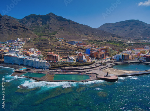 Aerial view of Puerto de la Cruz coastline in Tenerife from drone