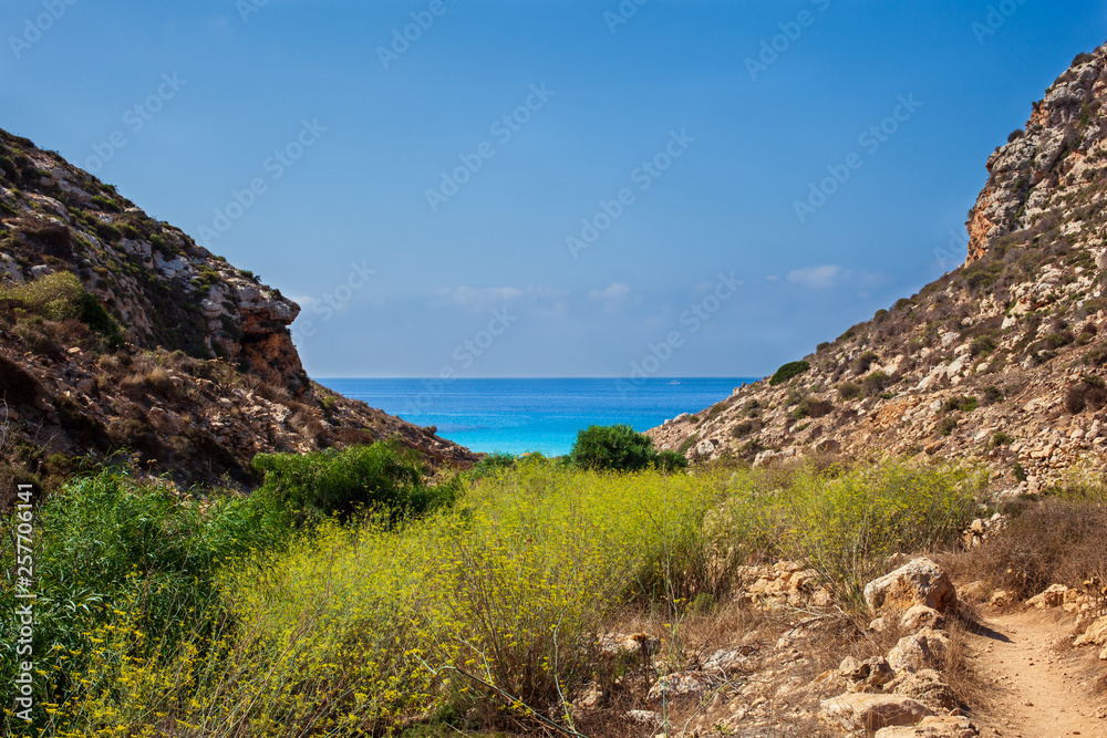 View of Cala Pulcino famous sea place of Lampedusa