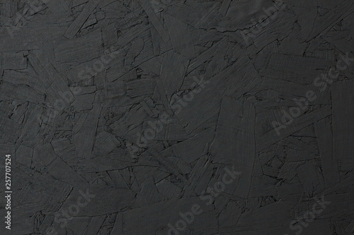 Wooden painted black. background.