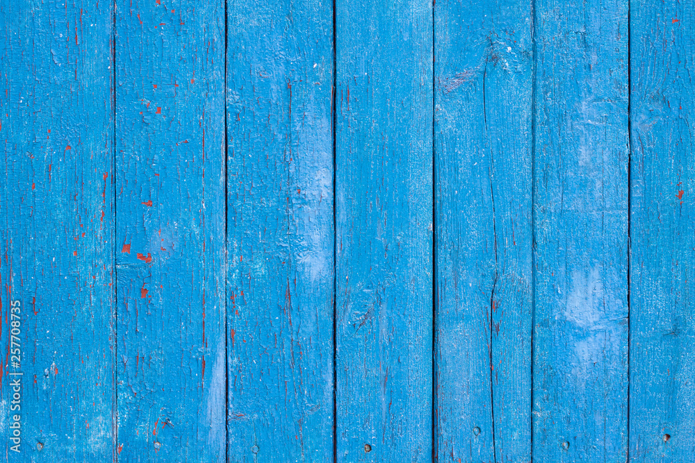 Old wooden board background with cracked paint Old wooden board background with cracked paint
