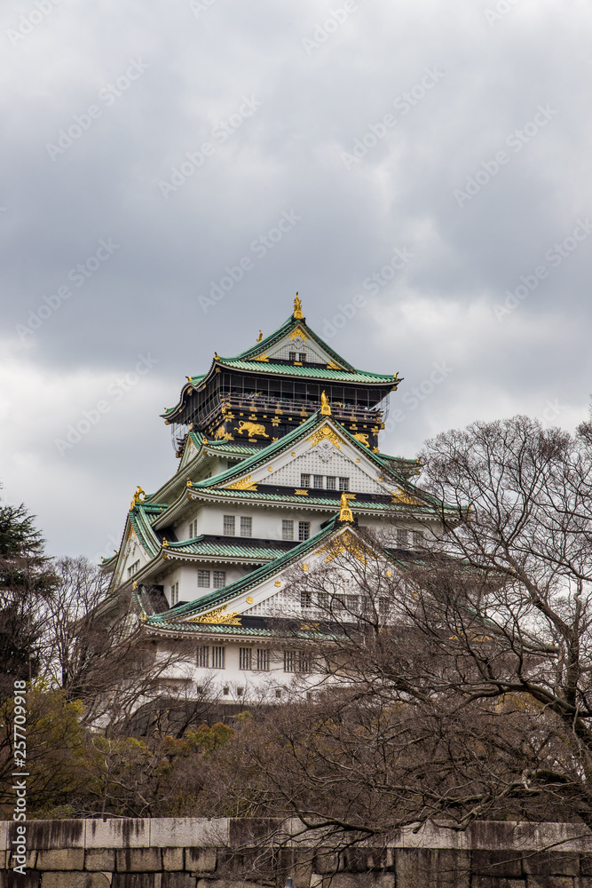 Famous Osaka castle in spring in cloudy day, Osaka, Kansai.