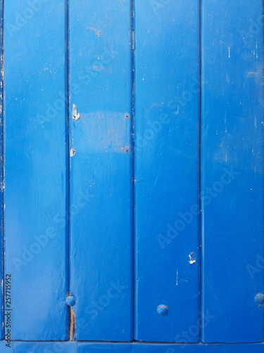 wooden door blue color © ctbperu