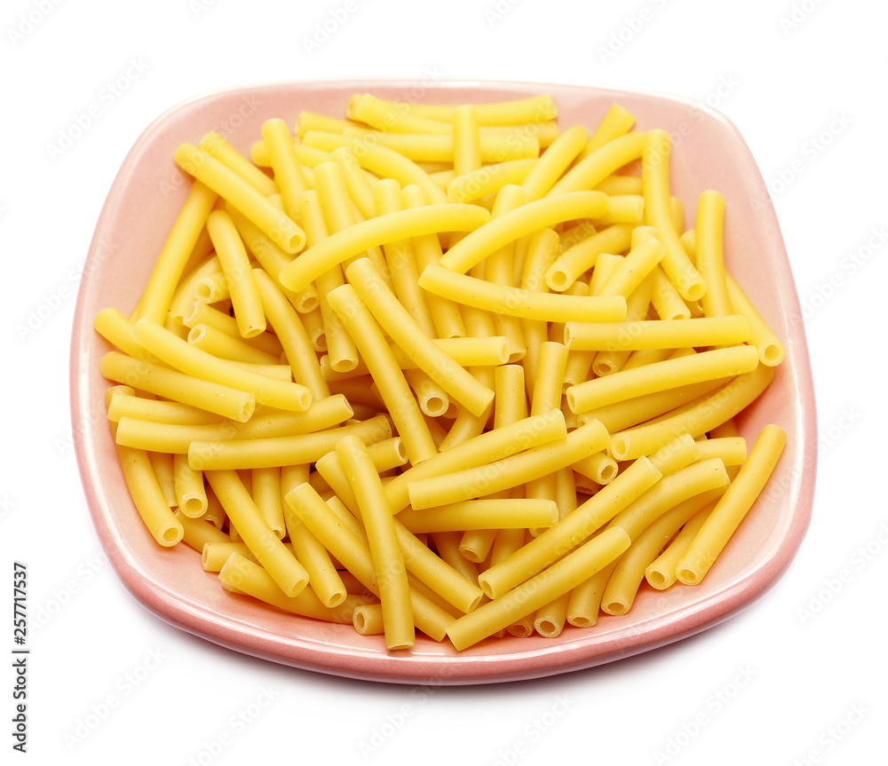 Macaroni raw pasta in porcelain bowl isolated on white background Macaroni raw pasta in porcelain bowl isolated on white background