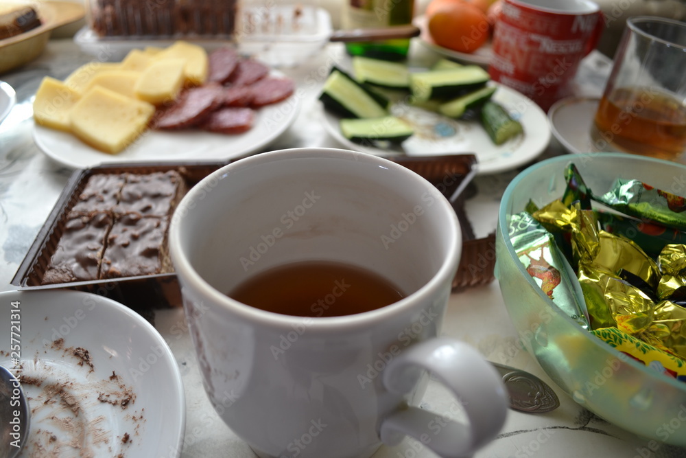 cup of tea and cookies on table cup of tea and cookies on table