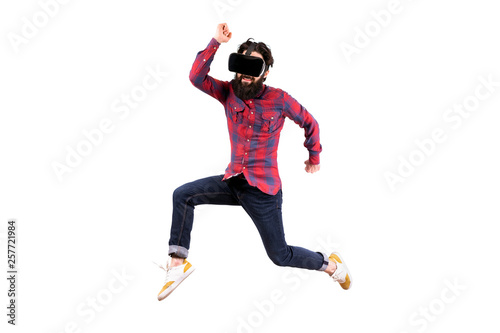 jumping bearded hipster in glasses of virtual reality, isolated on white background