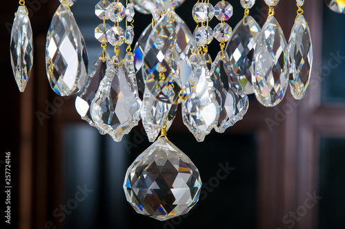 Crystal chandelier on the background of the window