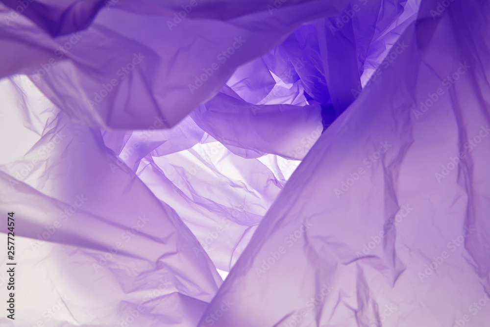 Obraz premium Plastic bag. Purple abstract background with uneven picture. For design, layouts and templates.