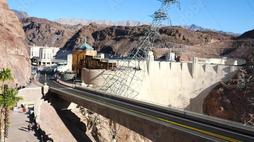 Vehicles Crossing The Wall Of The Hoover Dam wide