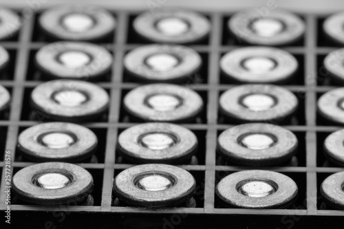 Pile of pistol bullets. The concept of limiting the spread of small arms. Black and white image photo