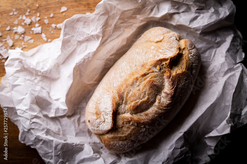 Bread. A loaf of bread with a golden crispy crust.