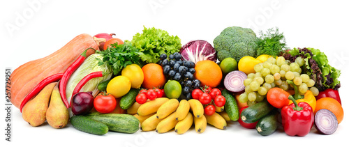 Heap fruit and vegetables isolated on white