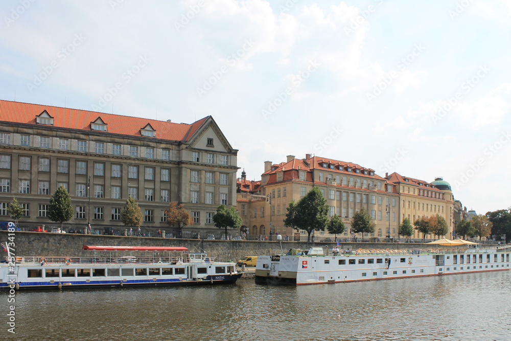 View of Prague's waterfront and historical architecture from the Vltava river in the Czech Republic
