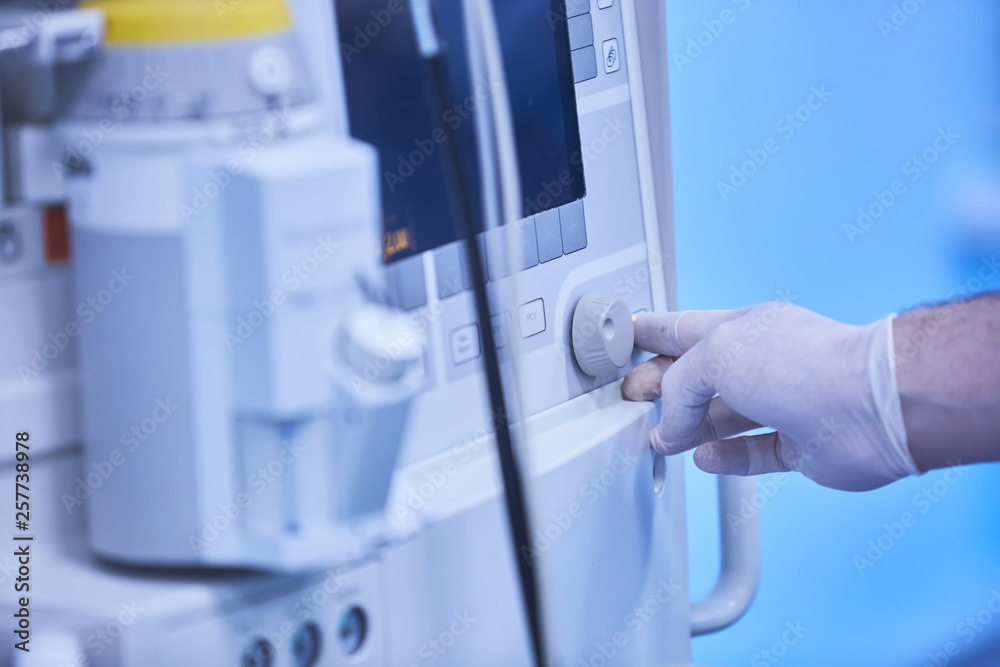 An anesthesia monitor shows real time vital signs for constant patient