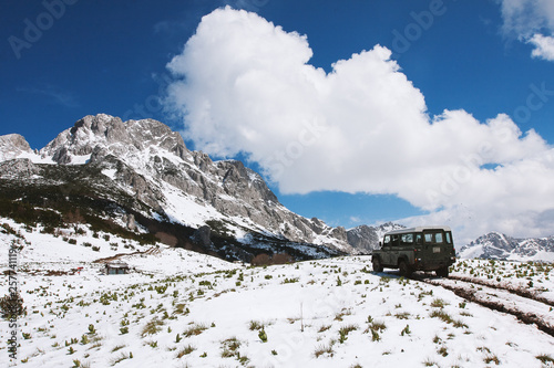 Off road vehicle at snowy mountain © Novak
