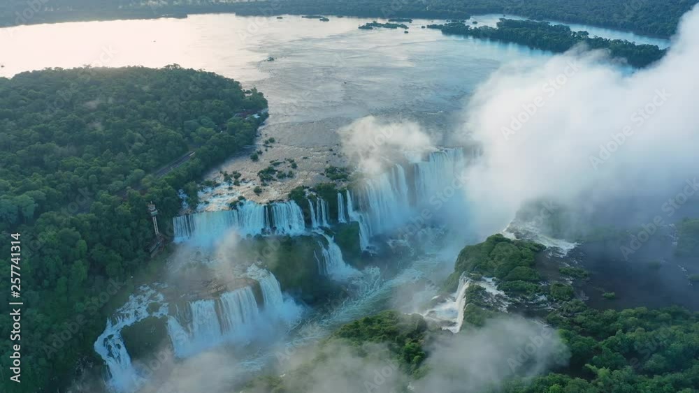 Aerial view of Iguazu Falls, monumental waterfalls on Iguazu River, Devil's Throat (Garganta del Diablo) waterfall - landscape panorama of Brazil/Argentina border, South America Aerial view of Iguazu Falls, monumental waterfalls on Iguazu River, Devil's Throat (Garganta del Diablo) waterfall - landscape panorama of Brazil/Argentina border, South America