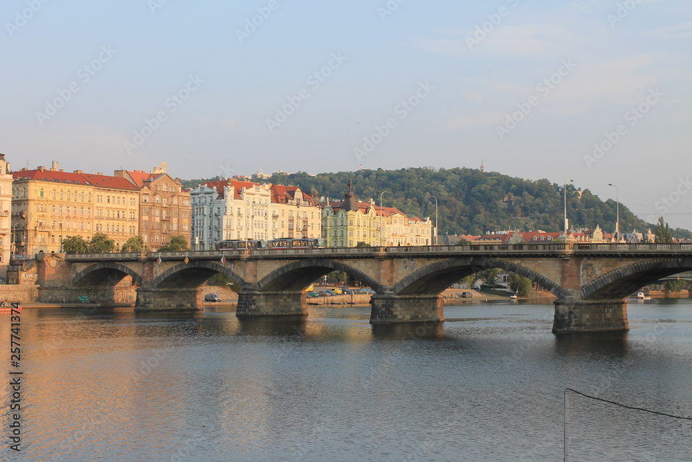 View of the embankment from the palatsky bridge in Prague 