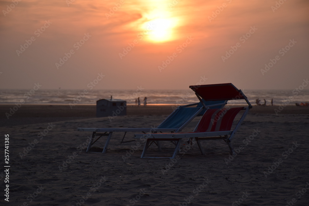 sunset beach with beach chairs the Netherlands