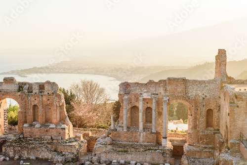 Greek reatre in Taormina Sicily, Italy, and Etna volcano in the background
