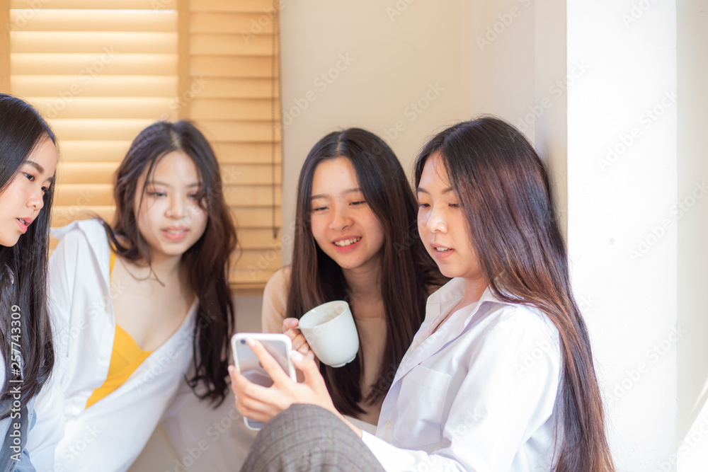 Group of pretty young asian women friend on bed