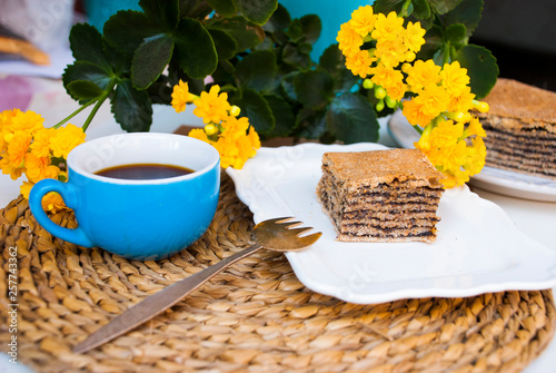 Pastry with poppy with cup of coffee. Nice spring breakfast. Traditional tajil katlama pie. photo