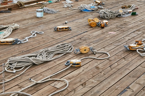 Sailing boat roaps on a deck photo