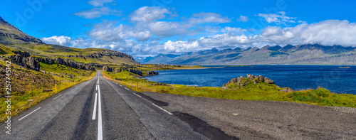 Ring road 1 in Eastern Iceland with the panoramic view at Stodvar Fjord at right.
