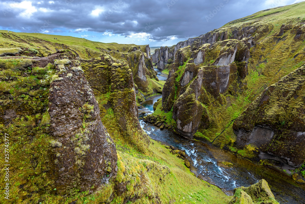 View of Fjadrargljufur Canyon towards the Atrantic Ocean, via the downstream of Fjadra river. South East of Iceland.