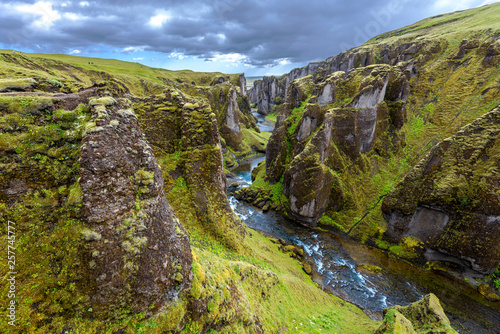View of Fjadrargljufur Canyon towards the Atrantic Ocean, via the downstream of Fjadra river. South East of Iceland.