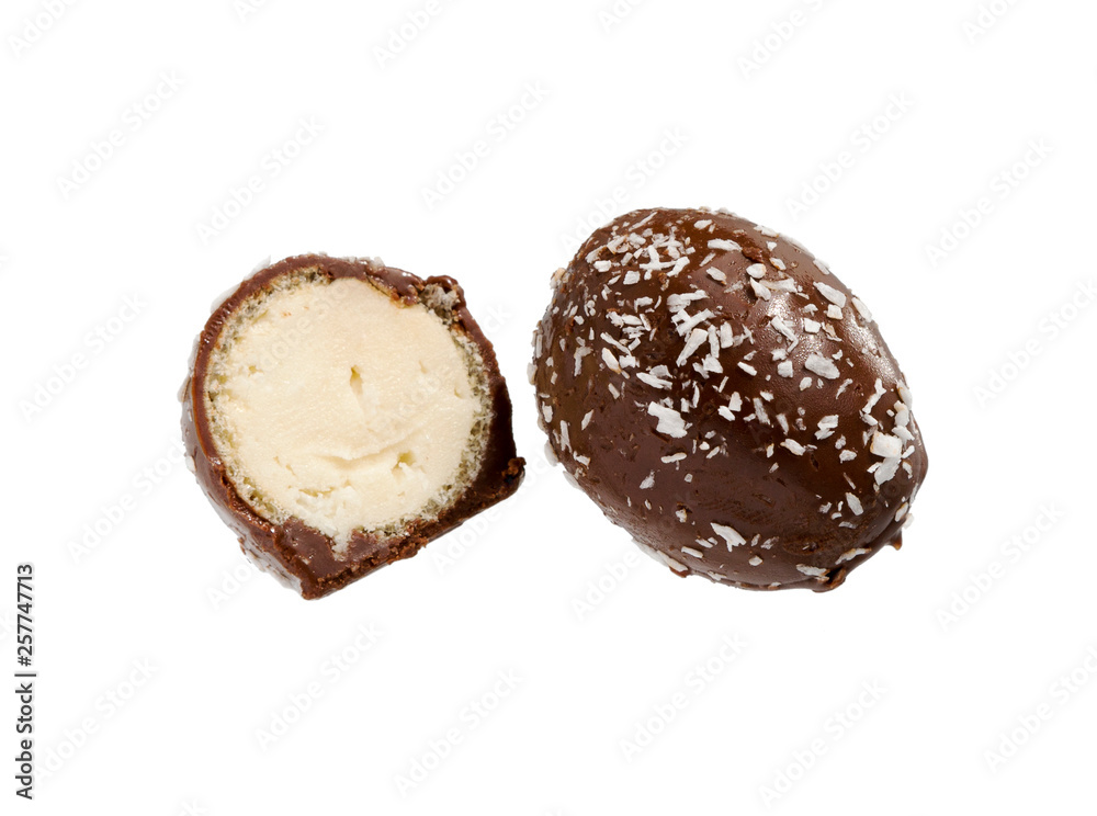 Chocolate candy with filling isolated on a white background. Chocolate candy with filling isolated on a white background.