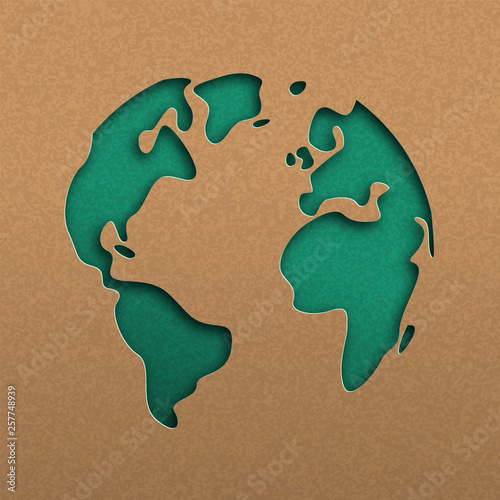 Green papercut world map on recycled paper