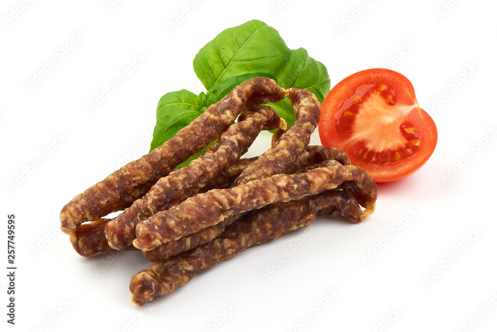 Dry wild meat sticks. Jerky sausages close-up, isolated on white background
