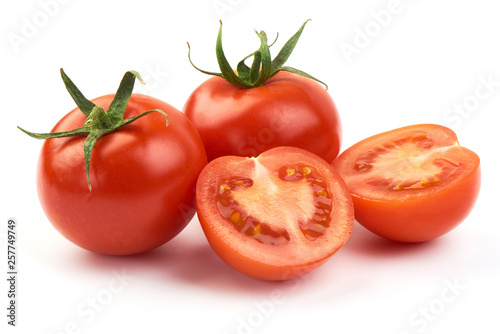 Juicy cherry tomatoes with half, close-up, isolated on white background