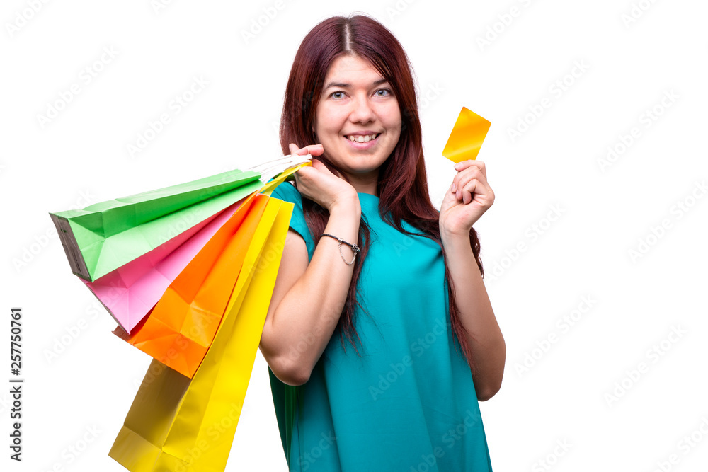 Happy young woman with shopping bags and credit card Happy young woman with shopping bags and credit card