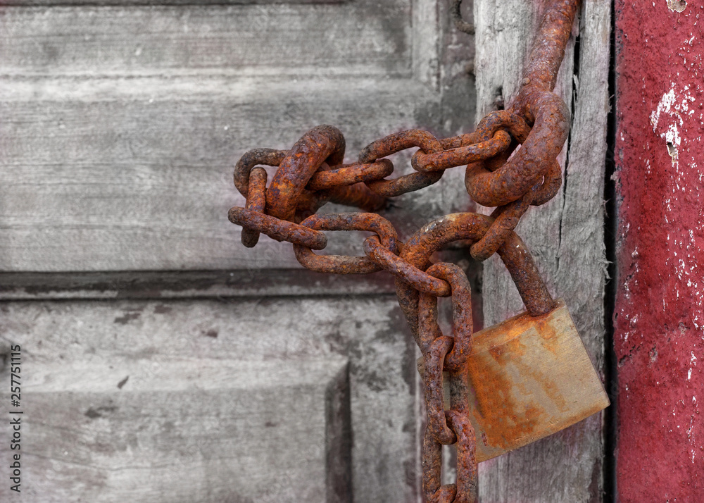 padlock on old door padlock on old door