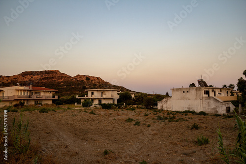 Semi-abandoned houses in Faliraki. Dusk. Rhodes, Greece.